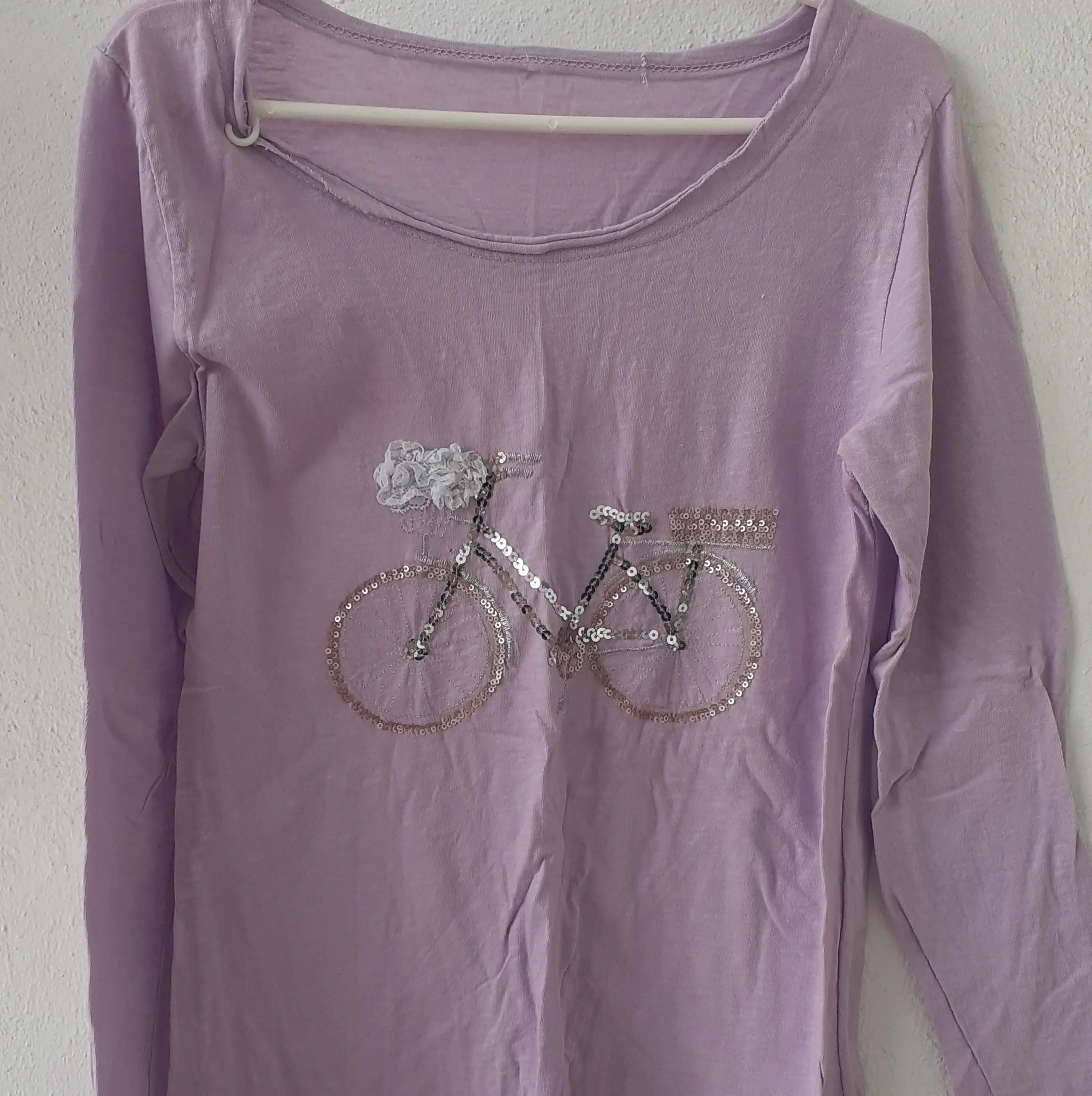 Camiseta Camiseta-manga-larga-bicicleta-mujer_resultado