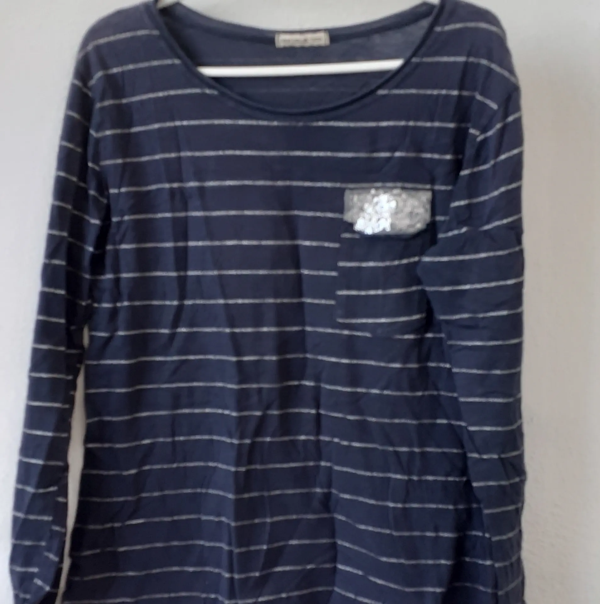 Camiseta-sin-mangas-gris-corazon-mujer_resultado